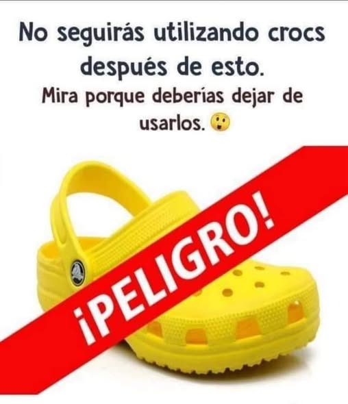 Zapato tipo Crocs amarillo con advertencia